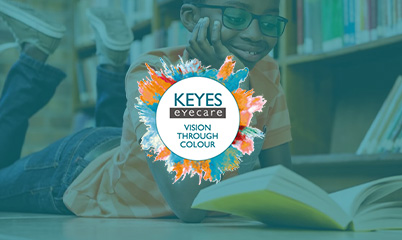 Boy reading a book in school library